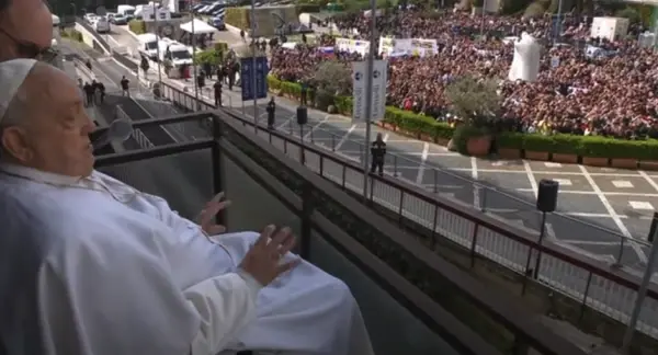 Pope Francis waves to the gathered faithful from the balcony at Gemelli Hospital in Rome on Sunday, March 23, 2025. (Photo: Vatican Media)