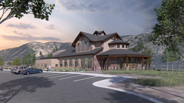 A computer-generated rendering of a church campus viewed from the parking lot.