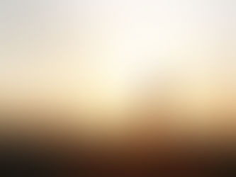 Silhouette of a person with a staff and a sheep against a golden sunrise, creating a peaceful and serene atmosphere on a hilltop.