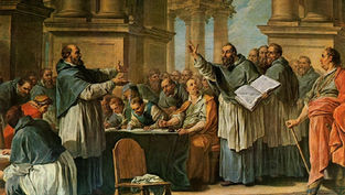 A group of men in robes gathered around a table, engaged in discussion. One holds a book up, gesturing. The setting is an ornate hall.