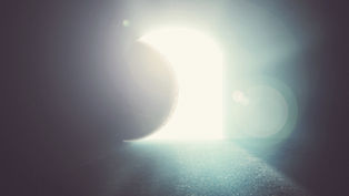 A large, illuminated door opens in a dim space, casting bright light and creating a serene, mystical atmosphere with soft lens flares.