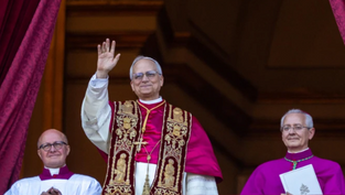 Three clergy on a balcony; central figure waves, wearing ornate robes. Red drapes frame them, creating a formal, uplifting scene.