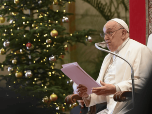 Pope Francis warns against gossip, celebrates family life in Vatican Christmas messages