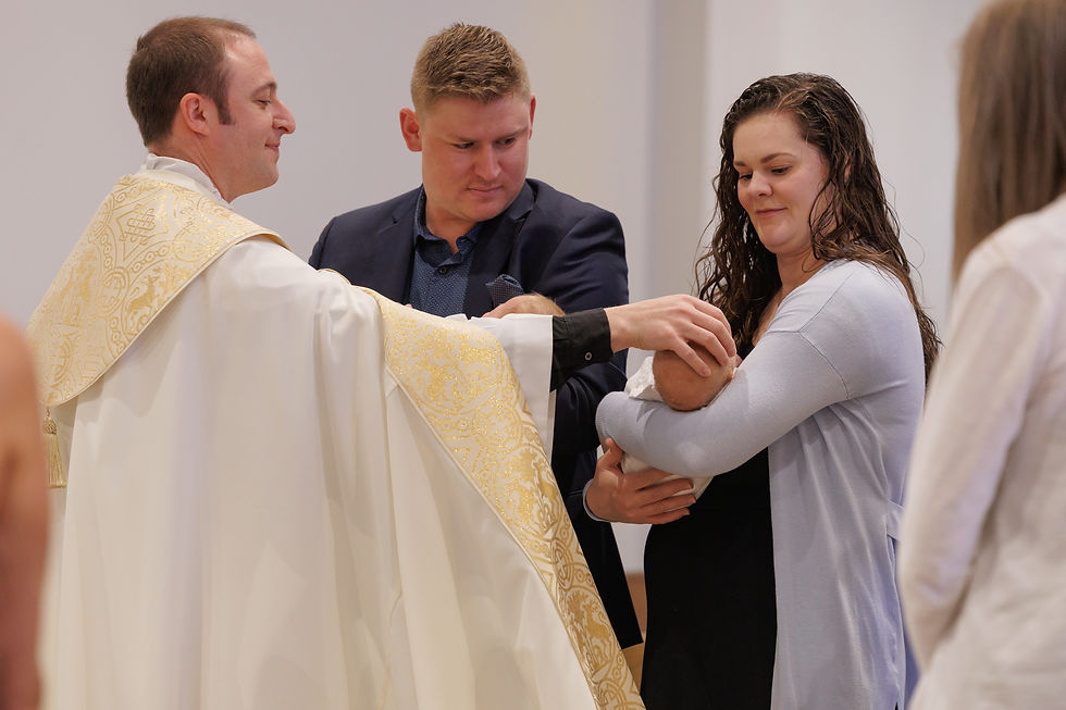 Priest baptizes a baby as parents hold the child in a church, with a calm, reverent mood.