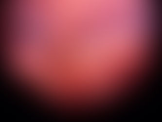 Fetus in womb highlighted in warm pink tones, raising a hand toward its face in a gentle, serene setting. No text visible.