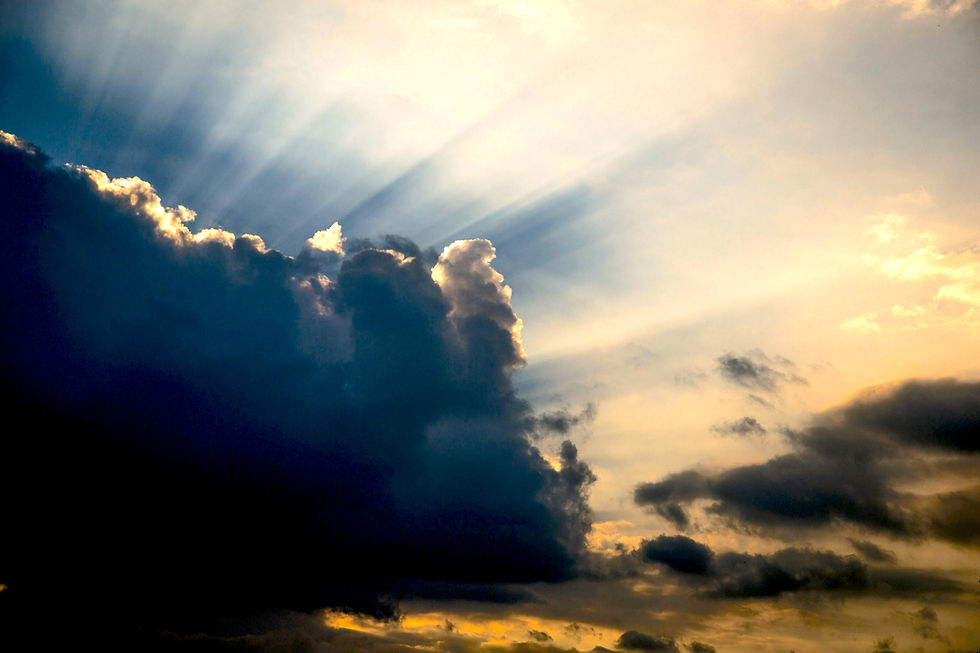 A white sun symbolizing the Holy Spirit against a blue to yellow gradient, representing hope.