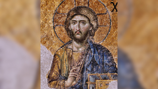 Mosaic of a figure with halo and gesture, holding a book, set against a golden background with intricate patterns and visible text.