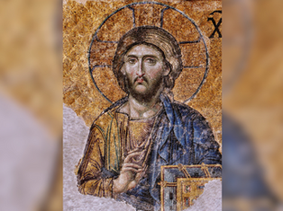 Mosaic of a figure with halo and gesture, holding a book, set against a golden background with intricate patterns and visible text.