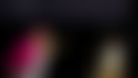 A bishop in pink and white attire kisses a gold object in a dimly lit space. Candles and a crucifix are on the altar. solemn mood.