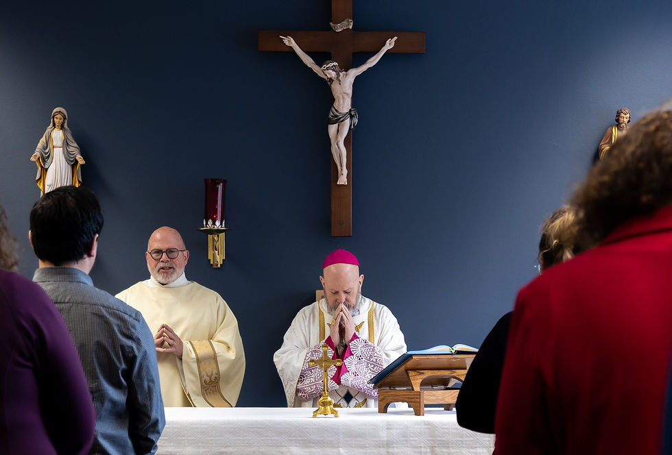 Archbishop Samuel J. Aquila prays during Mass preceding the unveiling of the new "Mary at the Foot of the Cross" icon, which will be the focal point of a nine-year novena leading up to the Great Jubilee of our Salvation in 2033. (Photo by Denver Catholic Staff)