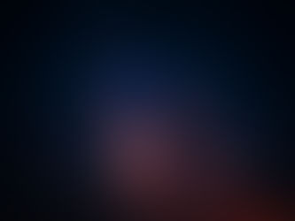 Starry night sky showing the Milky Way with vibrant blues and oranges. Dark, vast setting evokes wonder and serenity. No text visible.