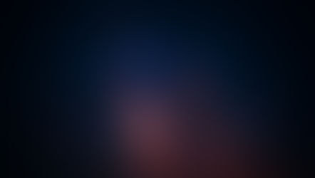 Starry night sky showing the Milky Way with vibrant blues and oranges. Dark, vast setting evokes wonder and serenity. No text visible.