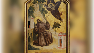 Medieval painting of Saint Francis kneeling with halo as an angel descends, on a gold background with small buildings.