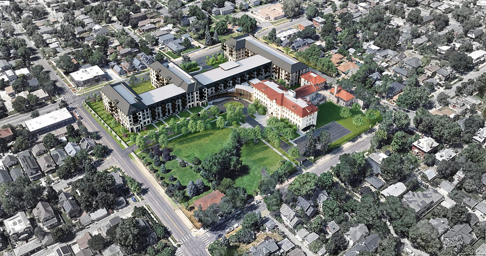 Aerial view of a neighborhood with a large U-shaped building, red-roofed structure, and green lawns. Surrounding houses and trees visible.