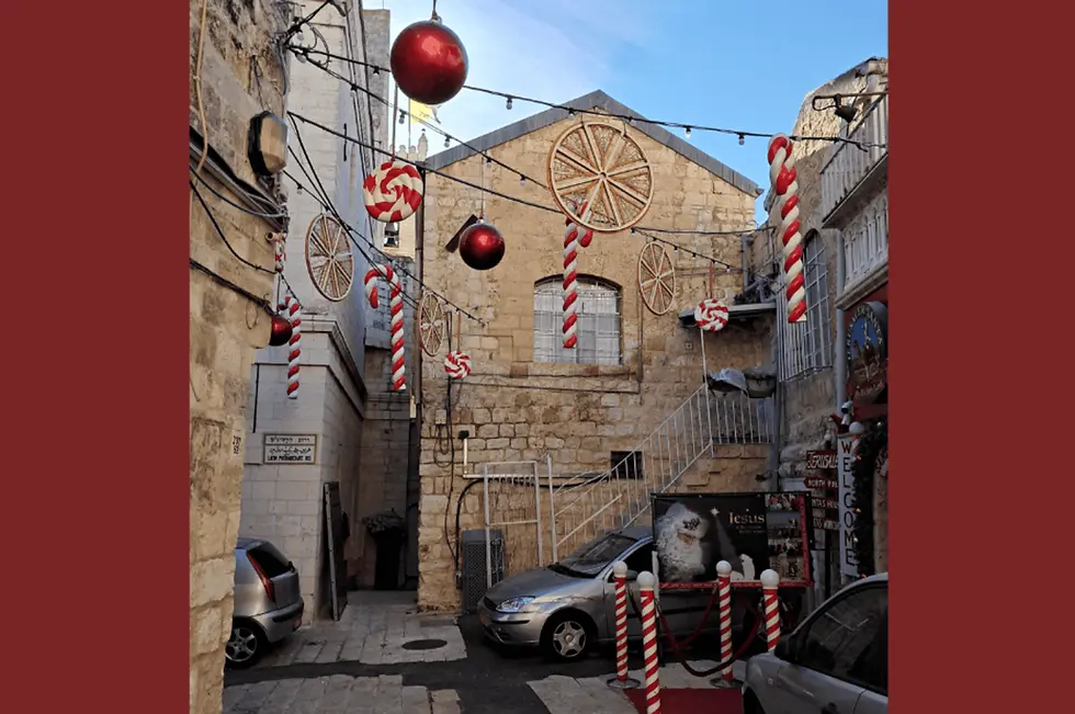 Candy cane ornaments add a festive touch to this year's Christmas celebrations in Jerusalem. (Photo: Michele Chabin)