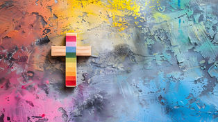 Wooden cross with rainbow stripes on colorful abstract background of blues, yellows, and reds. Vibrant, artistic, and inspiring.