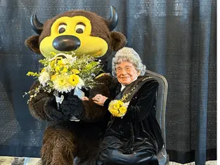 WATCH: 50,000 fans sing “Happy Birthday” to Peggy Coppom, CU superfan and faithful Catholic