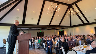 Archbishop Golka Invites Men into Pro-Life Mission at Catholic Charities' SonRISE Breakfast
