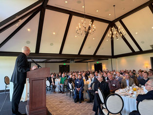 Archbishop Golka Invites Men into Pro-Life Mission at Catholic Charities' SonRISE Breakfast