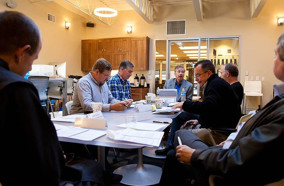 The local Attollo chapter meets once per month, and focuses on three main tracks of development: Personal, professional and faith formation. (Photo by Andrew Wright)