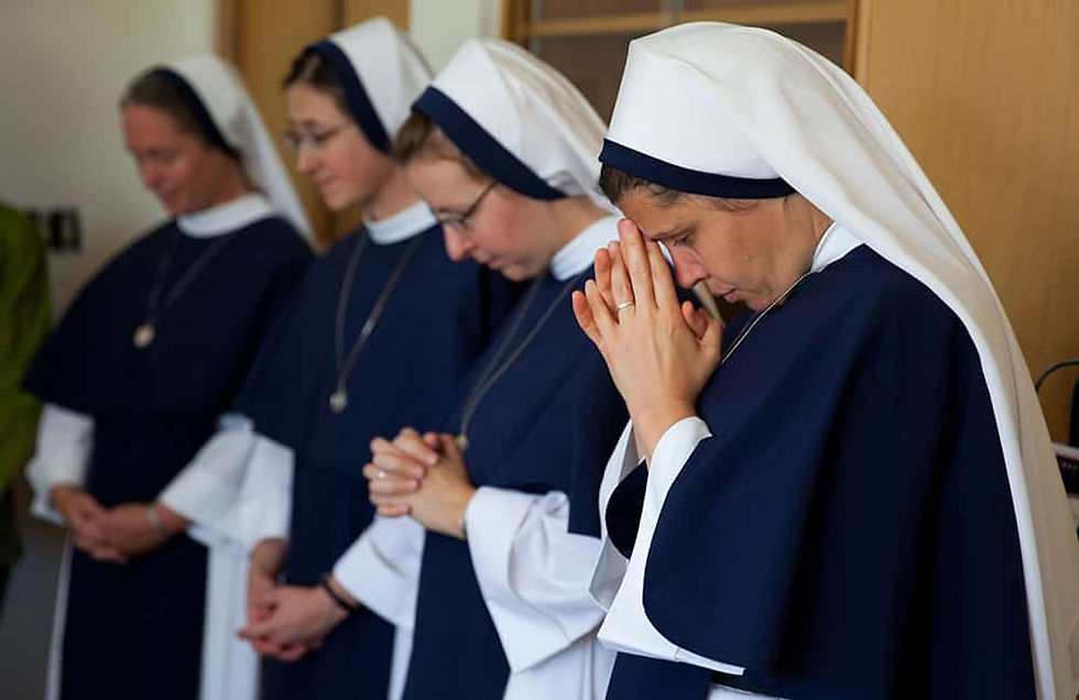 Sister Maris Stella (right) entered the Sisters of Life in 2006 following a career in the Navy, In 2015, she moved to Denver to help start a new Sisters of Life convent. Currently, she and several other sisters serve students on the campus of the University of Denver. (Photo by Andrew Wright/Denver Catholic)
