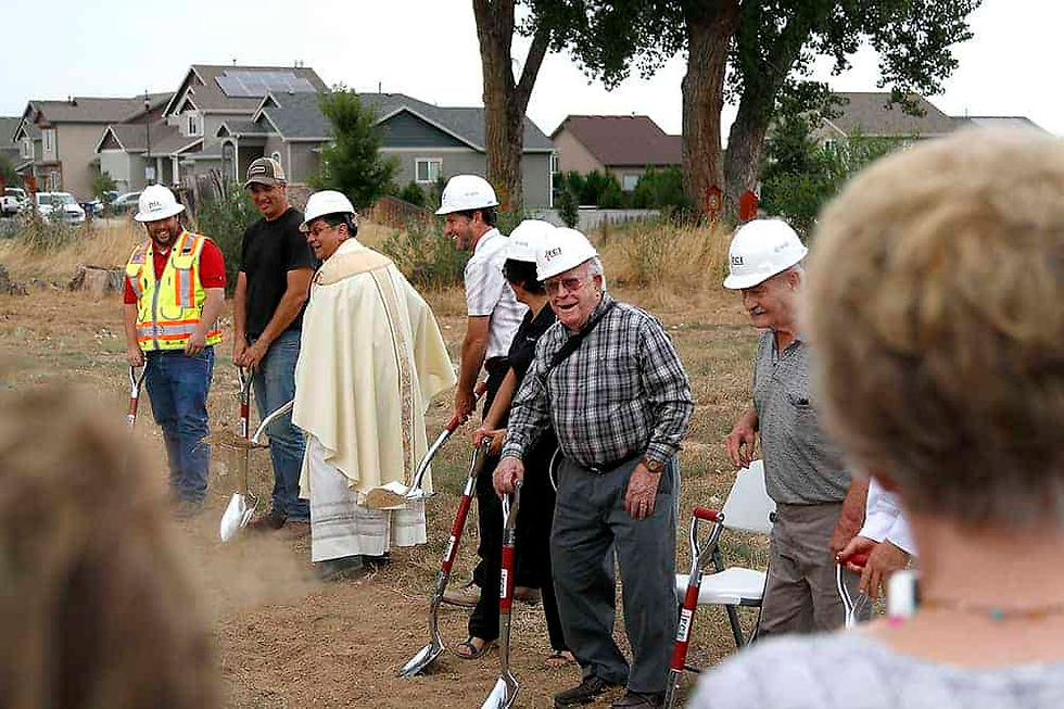Carmine DeSantis (pictured, center), has been a part of St. Theresa’s Parish since 1936. He says the church has deep roots in the community of Frederick. (Photos by Aaron Lambert)