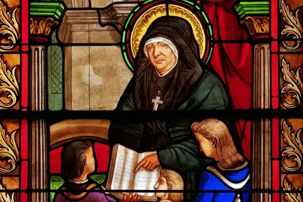 A detail from a stained-glass window featuring Marie Rivier in Bourg-Saint-Andéol, France. Public Domain.