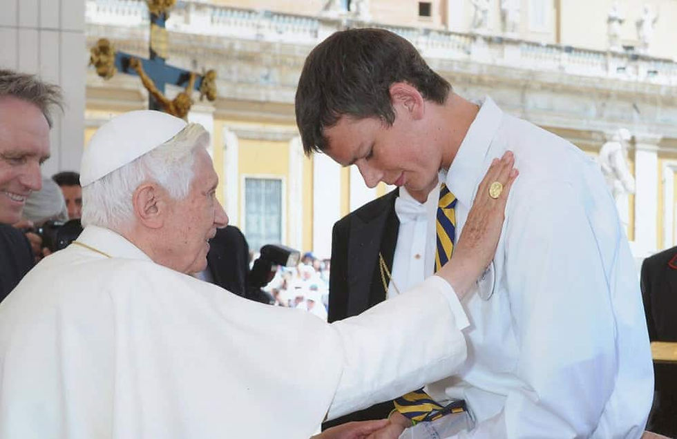 Srsich (right) pictured here receiving a blessing from Pope Benedict XVI in 2013. He was able to meet the Holy Father after completing his cancer treatments through the Make-A-Wish Foundation. (Photo courtesy of Father Srsich)