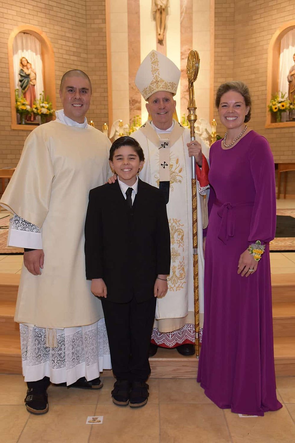 Deacon Derrick Johnson, pictured above with his wife and son, was ordained permanent deacon in June 2021. It was a path he never expected to go down, but in hearing a very distinct call from God, he answered. (Photo by James Baca)