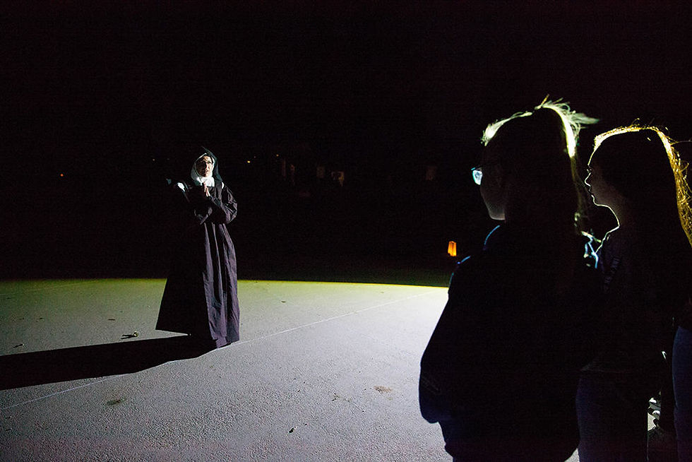 Actors and actresses from the Regis Ramblers, Regis University’s drama club, portrayed some of the religious figures students encountered during the tour, such as St. Therese of Lisieux pictured above. (Photos by Andrew Wright)