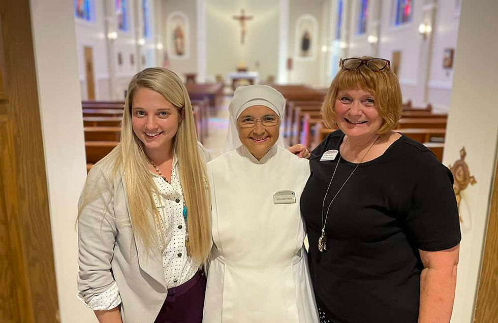 Sister Joseph Marie with Mullen Home staff members. (Photo by Aaron Lambert)