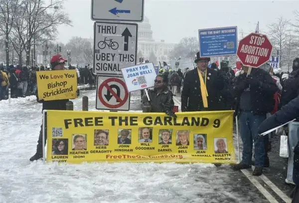 Pro-life activists protest the incarceration of nine activists charged with FACE Act violations.