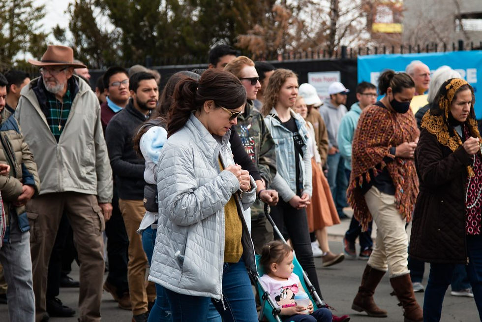 Hundreds gathered in prayer as they processed around Stapleton’s Planned Parenthood facility on Saturday. (Photo: André Escaleira, Jr.)
