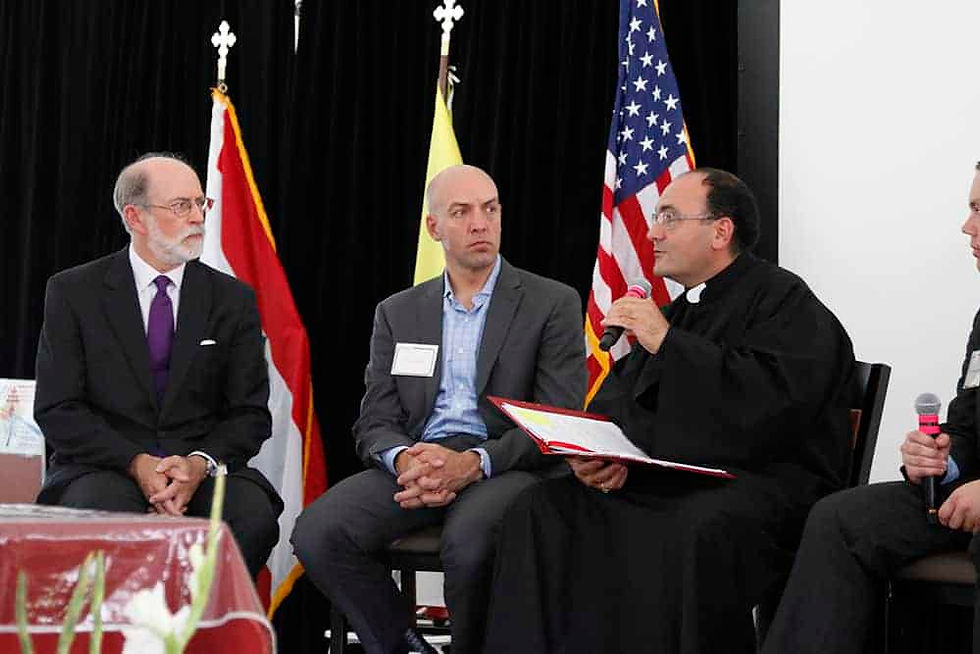 Frank Gaffney, left, and Eric Kniffin, middle, both spoke about the looming threats to religious liberty in the United States. (Aaron Lambert/Denver Catholic)