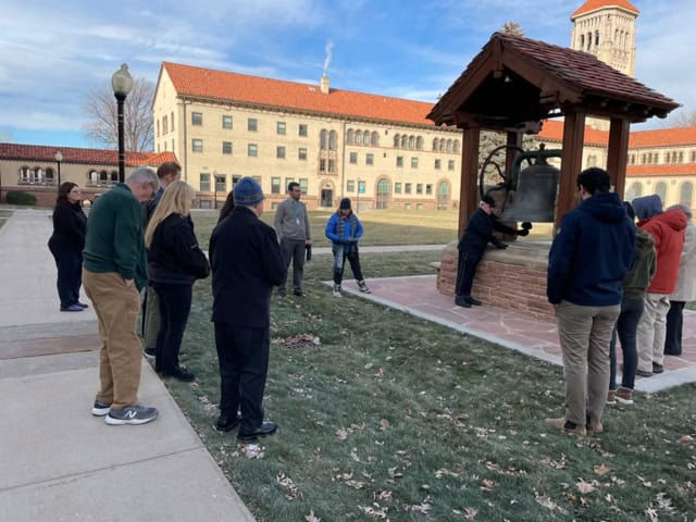 A small group of faithful gathered around the old seminary bell at the Archdiocese of Denver Pastoral Center Dec. 14 to pray for the victims of the Sandy Hook Massacre on the 10th anniversary of the tragedy. (Photo by Kelly Clark)