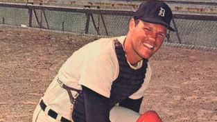 A Catholic gentleman behind the plate