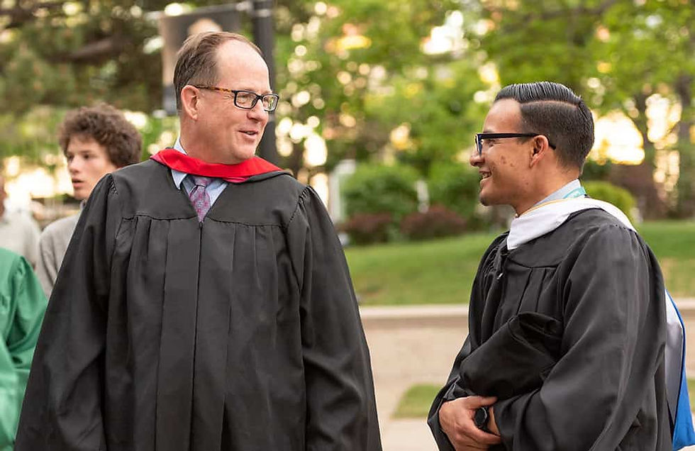 Harold Siegel (left) is transitioning from his role as Assistant Principal of Academics at Bishop Machebeuf into his new role as Principal. (Photo provided)