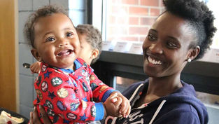 Following influx of families, Catholic Charities shelters step up to help