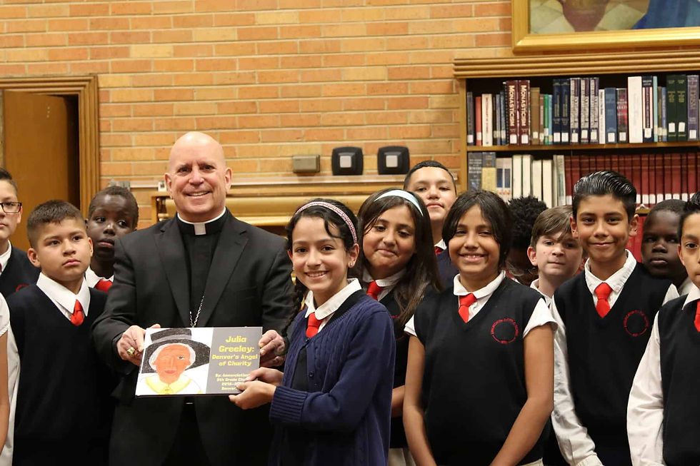 Archbishop Aquila was inspired by the students’ efforts to share with other young people the life of Julia Greeley, who is on her way to sainthood. Photo by Moira Cullings