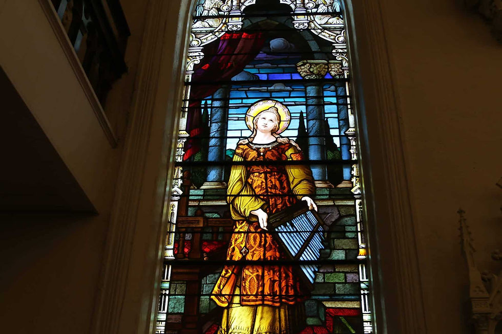 The stained-glass windows are a staple of St. Francis de Sales Catholic Church in Denver. Photo by Moira Cullings