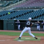 Fr. Darrick Leier hits a grand slam