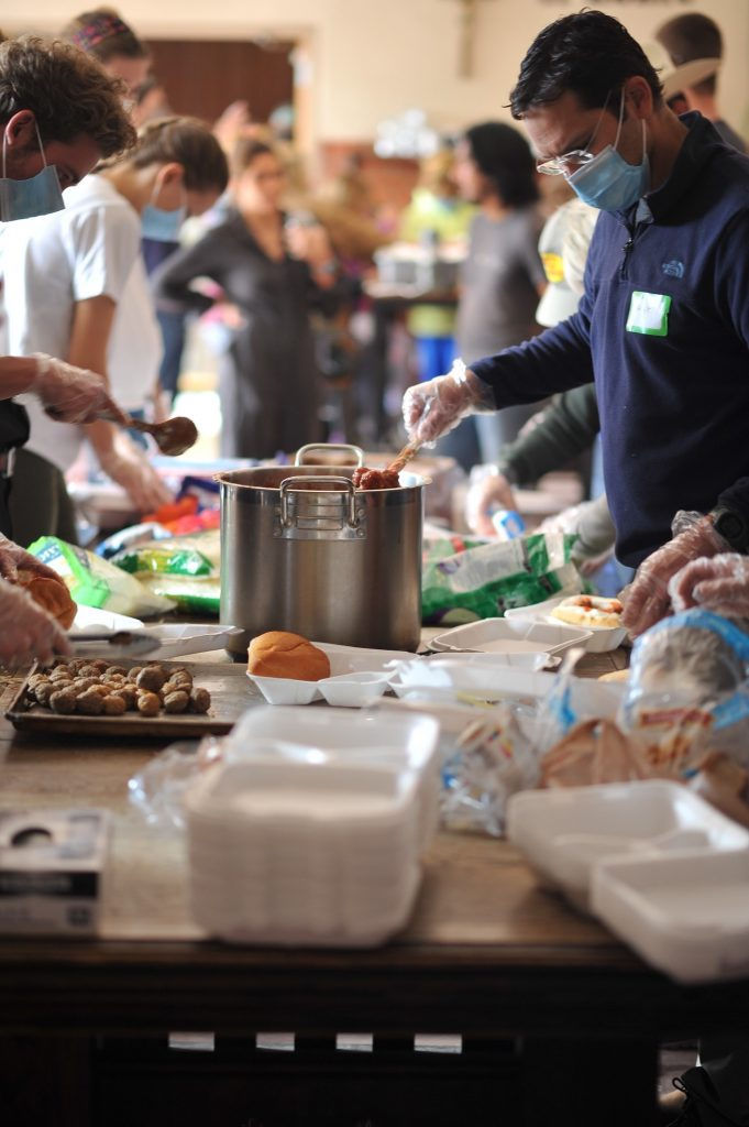 Volunteers from around the archdiocese gather to help prepare Lunch in the Park. For more information on how to volunteer with Christ in the City, visit https://christinthecity.org/volunteer/. (Photo courtesy of Christ in the City)