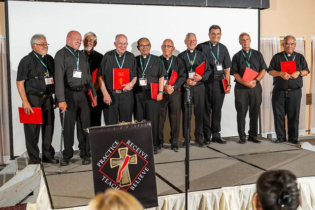 NORTHGLENN, CO - AUGUST 10: Deacons are honored for their service by Deacon Ernie Martinez (R) during a Deacon Day awards dinner at Immaculate Heart of Mary Catholic Parish on August 10, 2023, in Northglenn, Colorado. (Photo by Daniel Petty/Denver Catholic)