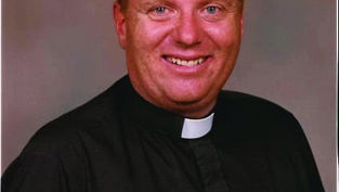Father “Bill” Carmody known for being tireless life warrior
