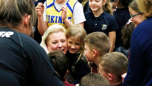 Students surprise Longmont principal with her own graduation ceremony