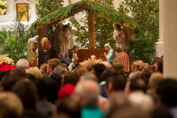 DENVER, CO - DECEMBER 25: Archbishop Samuel J. Aquila celebrates the Christmas midnight mass at the Cathedral Basilica of the Immaculate Conception on December 25, 2014, in Denver, Colorado. (Photo by Daniel Petty/Denver Catholic Register)