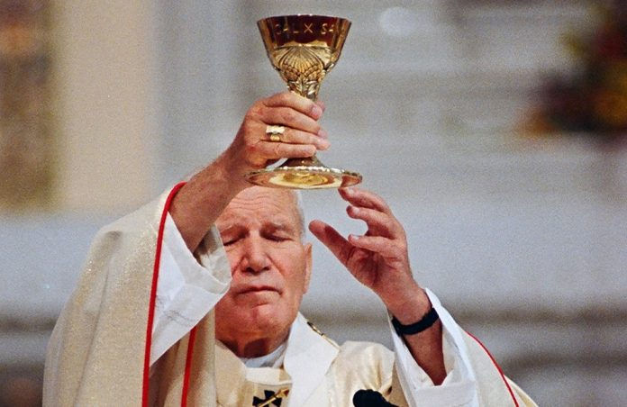 Pope John Paul II celebrates Mass at Cathedral Basilica of the Immaculate Conception for pilgrims from each diocese in U.S. and International delegates. (File photo by James Baca/Denver Catholic Register)