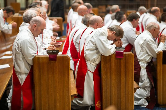 Deacons pray during a Deacon Day Mass at Immaculate Heart of Mary Catholic Parish on August 10, 2023, in Northglenn, Colorado. (Photo by Daniel Petty/Denver Catholic)