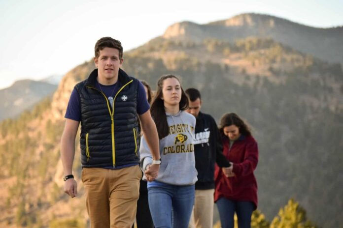 Retreatants and staff on CU-Boulder's Buffalo Awakening retreat hike and pray together, led by staffer Marco Capraro. Photo by Sarah Tran.