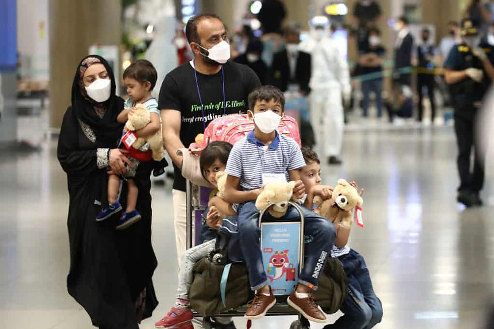 INCHEON, SOUTH KOREA - AUGUST 26: (SOUTH KOREA OUT) Evacuees from Afghanistan arrive at Incheon International Airport on August 26, 2021 in Incheon, South Korea. A total of 378 Afghans arrived in South Korea on Thursday as part of Seoul's efforts to evacuate local co-workers of the country's embassy and other facilities in the war-torn nation after the Taliban's seizure of power. (Photo by Chung Sung-Jun/Getty Images)